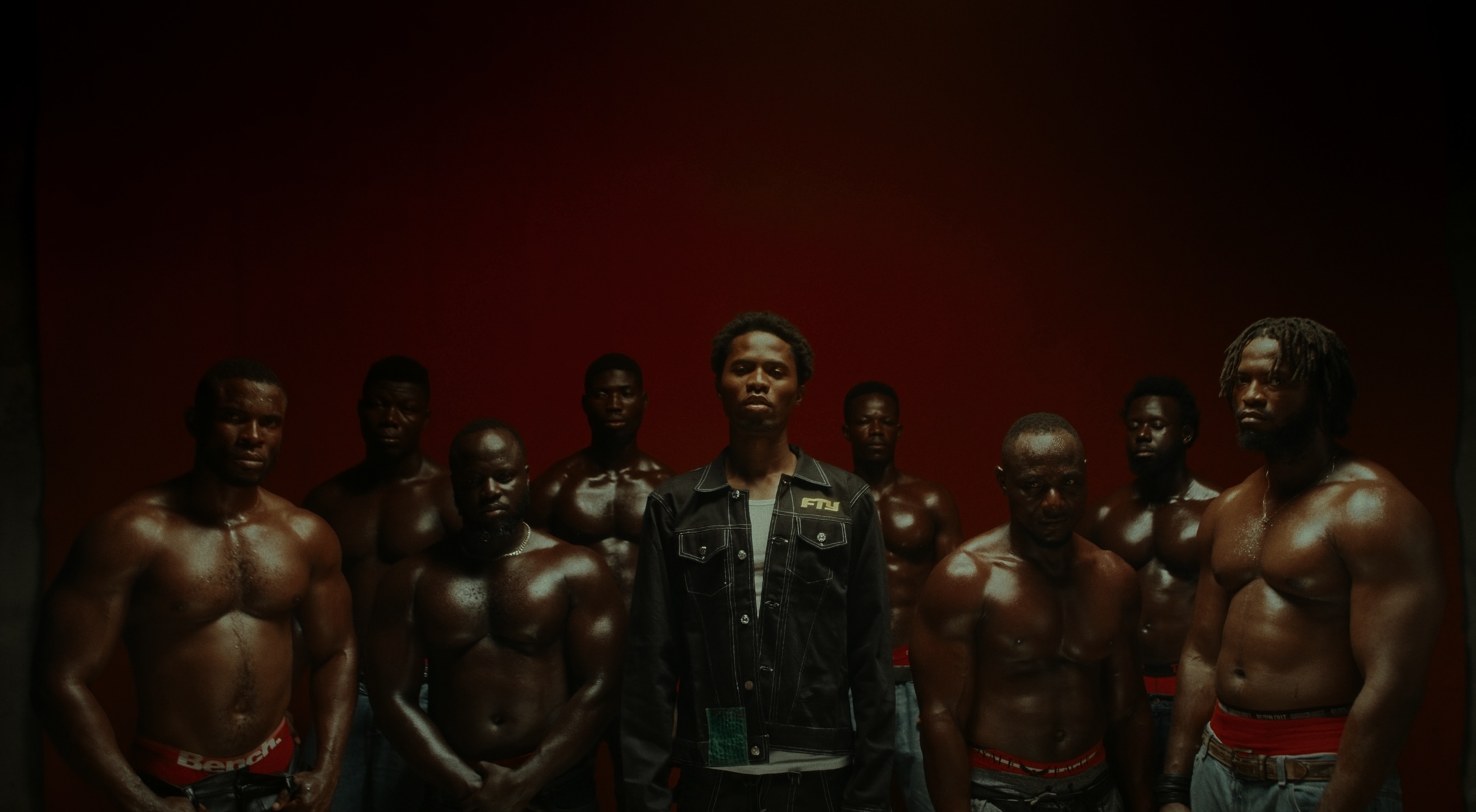 Screen grabs from the “FEFE NE FE” music video by Kwesi Arthur. Color ...